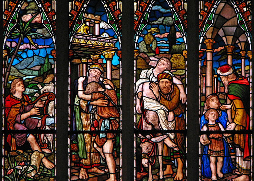 Stained glass window depicting four scenes from the "Parable of the Prodigal Son"